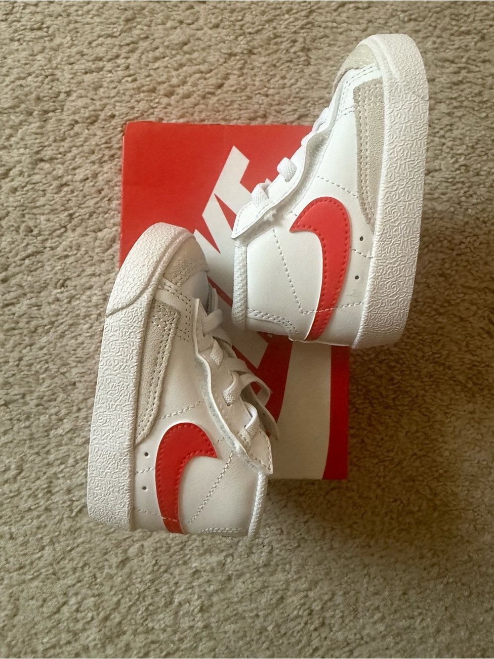 Nike Kids White Sneakers with Red and Blue Swoosh